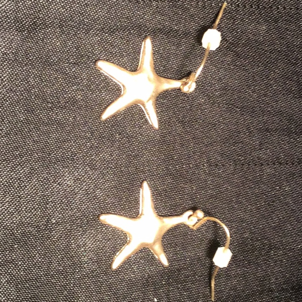 Women’s gold starfish earrings
